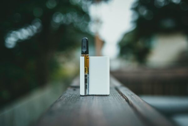 a white cased electronic vape